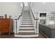 Classic staircase with dark wood treads and white risers at 5024 W Homer Ave, Tampa, FL 33629