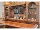 Custom wet bar with premium finishes and built-in cabinetry at 5024 W Homer Ave, Tampa, FL 33629