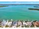 Breathtaking aerial view of waterfront homes with docks on a picturesque coastline at 535 Johns Pass Ave, Madeira Beach, FL 33708