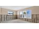 Spacious room features large windows offering picturesque water views, enhancing the room's appeal and ambiance at 535 Johns Pass Ave, Madeira Beach, FL 33708