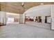 Bright and airy living room with wood ceiling, awaiting customization and personalization at 535 Johns Pass Ave, Madeira Beach, FL 33708