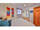 Bedroom featuring wood floors, bright decor, and a door to an outdoor deck at 5601 2Nd N Ave, St Petersburg, FL 33710