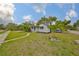 Landscaped yard with stepping stone pathway leading up to home at 5601 2Nd N Ave, St Petersburg, FL 33710