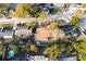 An aerial view highlights this property's desirable location within a neighborhood with lush greenery and convenient access at 6125 Liberty Ave, Temple Terrace, FL 33617