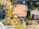 Aerial shot showcasing the property's layout and landscaping, set in a neighborhood with mature trees and accessible streets at 6125 Liberty Ave, Temple Terrace, FL 33617
