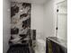 Luxurious bathroom featuring sleek black and gold marble tiles with a built-in bench at 6125 Liberty Ave, Temple Terrace, FL 33617