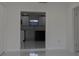 Bright entryway leading to kitchen with a modern and open concept design at 6125 Liberty Ave, Temple Terrace, FL 33617