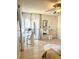 Bright dining area with a table and chairs next to a sliding glass door and a mirror at 6826 Stones Throw N Cir # 11305, St Petersburg, FL 33710