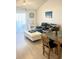 Comfortable living room with sleek floors, showcasing a cozy seating area, dining space, and natural light at 6826 Stones Throw N Cir # 11305, St Petersburg, FL 33710