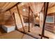 Unique attic with exposed beams and wood ceiling at 701 S Edison Ave, Tampa, FL 33606