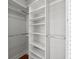 Organized closet with ample shelving and storage rods for efficient use of space at 701 S Edison Ave, Tampa, FL 33606