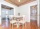 Bright dining room with a view into the living room and bedroom at 701 S Edison Ave, Tampa, FL 33606