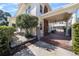 Gated brick driveway and covered parking enhance this home's curb appeal and functionality at 701 S Edison Ave, Tampa, FL 33606