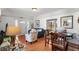 Comfortable living room area with a wood dining table at 701 S Edison Ave, Tampa, FL 33606