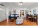 Comfortable living room with wood floors and a blue sofa at 701 S Edison Ave, Tampa, FL 33606