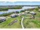 Aerial view of amenities including covered picnic space, and walking path around the community at 7040 Key Haven Rd # 606, Seminole, FL 33777