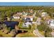 This elevated view showcases a beautiful, well-maintained community with pond views at 7820 Marsh Pointe Dr, Tampa, FL 33635