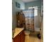 Bright bathroom with a shower-tub combo, vanity, and stylish beach themed decor at 8214 Tabbystone Pl, Bradenton, FL 34201