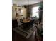 Dining room with a large table, seating for six, and stylish decorations at 8214 Tabbystone Pl, Bradenton, FL 34201
