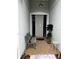 Inviting front porch with bench and decorative plants at the entry at 8214 Tabbystone Pl, Bradenton, FL 34201