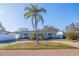 Charming single-story home with manicured lawn and mature trees at 934 41St Ne Ave, St Petersburg, FL 33703