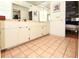 Bathroom featuring a double sink vanity with ample counter space and storage at 9805 Hermosillo Dr, New Port Richey, FL 34655