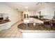 Expansive kitchen with granite countertops, custom cabinetry, and an open layout, perfect for cooking and entertaining at 9805 Hermosillo Dr, New Port Richey, FL 34655