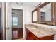 Granite countertop and sink highlight the bathroom at 902 Estelle Ave, Brandon, FL 33511