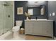 Elegant bathroom featuring a sleek vanity with a vessel sink and a glass-enclosed shower at 1039 N Missouri Ave, Clearwater, FL 33755