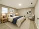 Inviting bedroom featuring neutral tones, stylish decor, and ample natural light at 1039 N Missouri Ave, Clearwater, FL 33755
