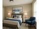 Cozy bedroom featuring a comfortable bed, neutral decor, and a tranquil setting at 1039 N Missouri Ave, Clearwater, FL 33755