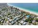 Aerial view of the neighborhood, highlighting proximity to the beach at 112 79Th St # B, Holmes Beach, FL 34217