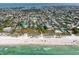 An aerial view of a quaint neighborhood close to the beach and ocean at 112 79Th St # B, Holmes Beach, FL 34217