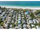 Aerial view of a coastal neighborhood, showcasing the proximity to the beach at 112 79Th St # B, Holmes Beach, FL 34217