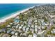 Coastal home near the ocean, featuring a pristine beach and lush greenery at 112 79Th St # B, Holmes Beach, FL 34217