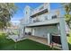 Backyard with pool, deck and spiral staircase, plus mini-golf on artificial turf at 112 79Th St # B, Holmes Beach, FL 34217