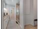 Bathroom showcasing a long vanity with double sinks and a glass enclosed shower at 112 79Th St # B, Holmes Beach, FL 34217