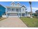 Inviting two-story home with a spacious garage and well-maintained front yard at 112 79Th St # B, Holmes Beach, FL 34217