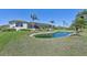 Backyard view with pond at 1145 Boundary Blvd, Rotonda West, FL 33947