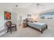 Bedroom with neutral carpet, bright walls, and a window at 1145 Boundary Blvd, Rotonda West, FL 33947