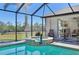 Relax in the tiled hot tub, part of this screened enclosure at 1145 Boundary Blvd, Rotonda West, FL 33947