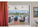 Comfortable lanai seating with views of the sparkling pool and lush landscaping at 1145 Boundary Blvd, Rotonda West, FL 33947