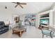 Spacious living room with tile floors and sliding glass doors leading to the outdoor patio at 1145 Boundary Blvd, Rotonda West, FL 33947