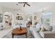 Comfortable living room with stylish decor and a large area rug on tile flooring at 1145 Boundary Blvd, Rotonda West, FL 33947