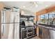 This stainless steel outdoor kitchen features a grill, sink, and ample storage space at 1145 Boundary Blvd, Rotonda West, FL 33947