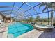 Relax poolside in a private screened enclosure with a spa at 1145 Boundary Blvd, Rotonda West, FL 33947