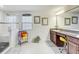 Inviting bathroom featuring a tiled shower with a glass door and a double vanity at 12857 Satin Lily Dr, Riverview, FL 33579