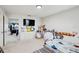 Cozy bedroom featuring soft plush toys and a comfortable bed, perfect for relaxation at 12857 Satin Lily Dr, Riverview, FL 33579