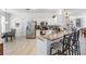 Bright kitchen features stainless steel appliances, granite countertops, and a breakfast bar seating area at 13247 Palmilla Cir, Dade City, FL 33525