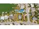 Overhead aerial view of the property showcasing its proximity to the canal and neighboring homes at 14031 E Parsley Dr, Madeira Beach, FL 33708